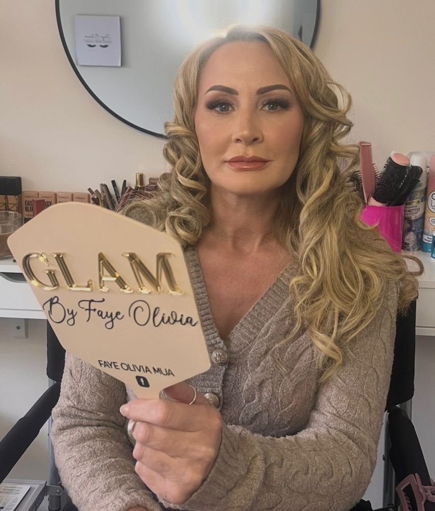 Soft glam makeup and blonde curls with a Faye Olivia sign