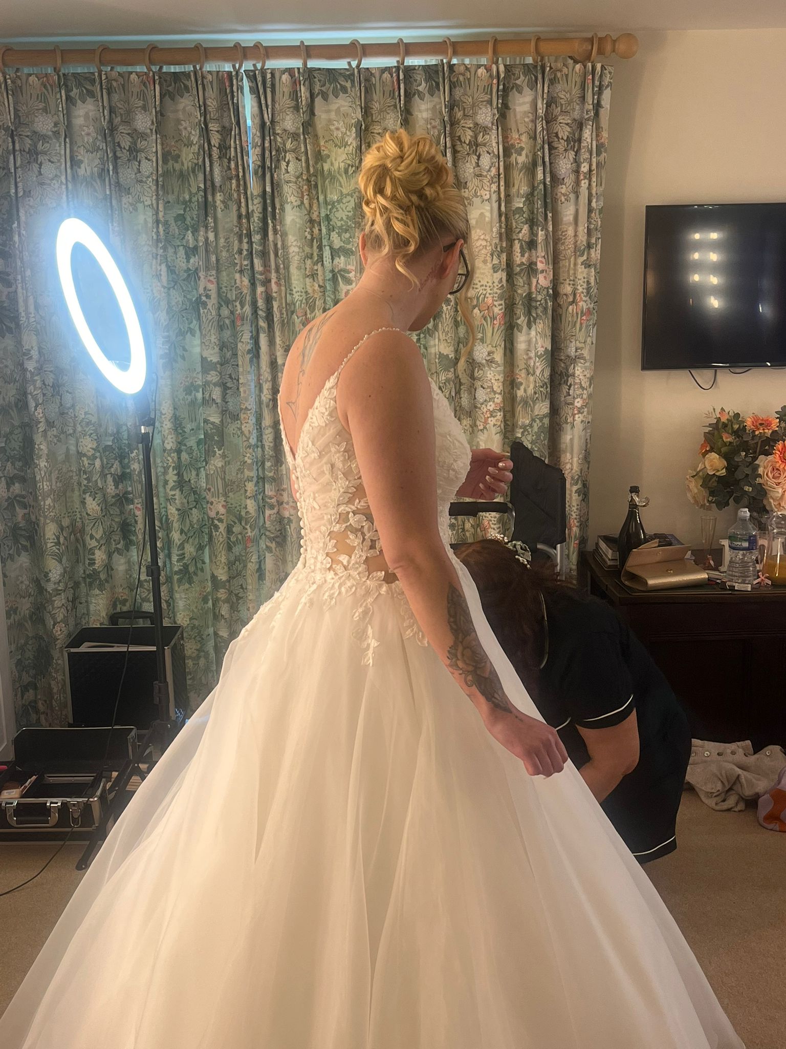 Bride showing soft bridal hair styling from the side