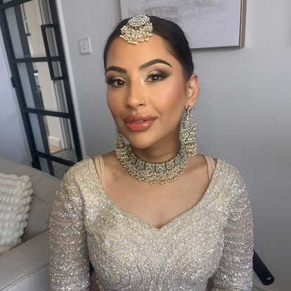 Full glam makeup with defined eyes and jewellery