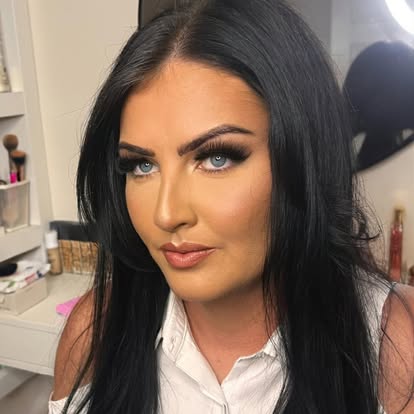 Smokey eye glam makeup with defined brows